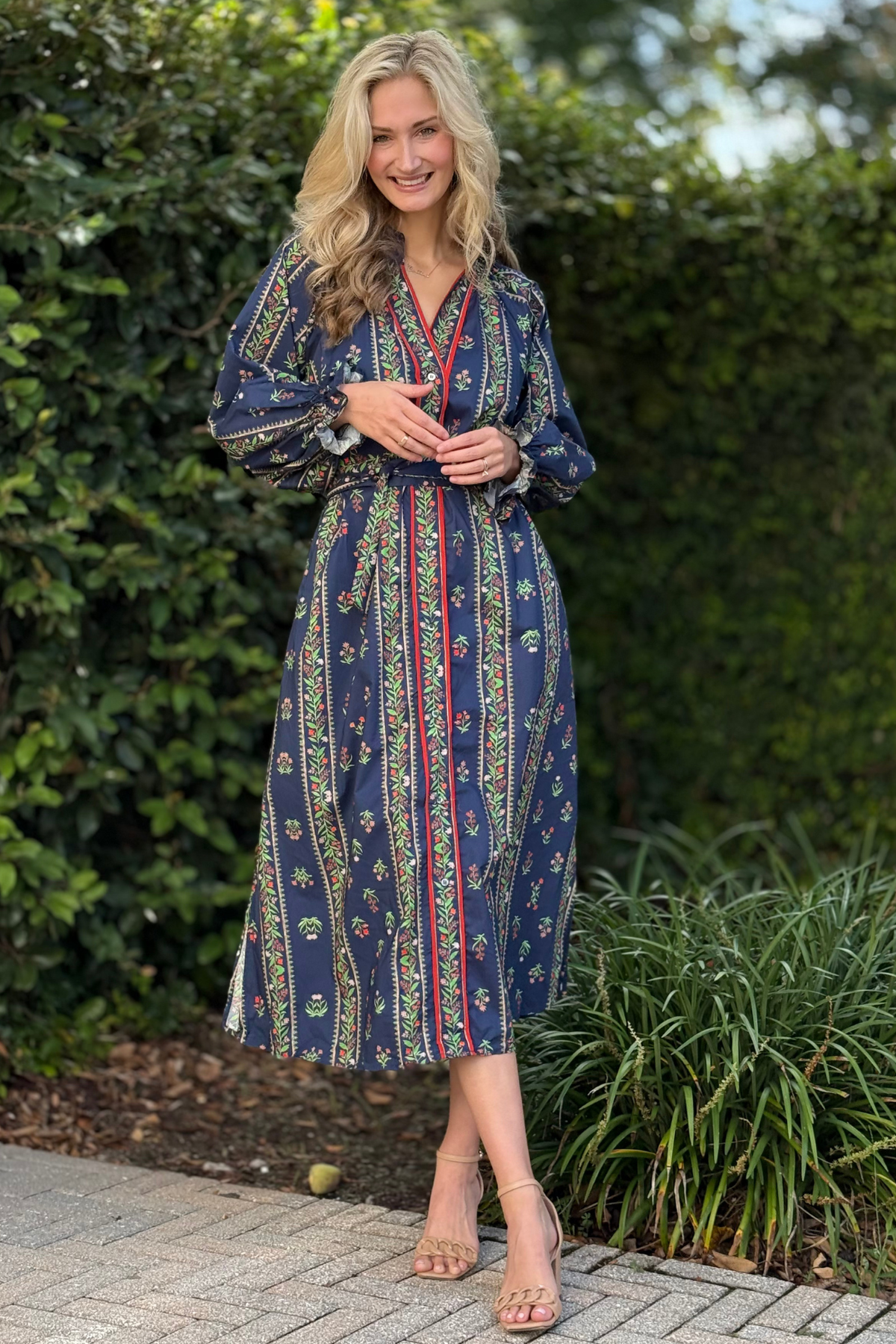 Side view of The Willow Floral Midi Dress with pockets