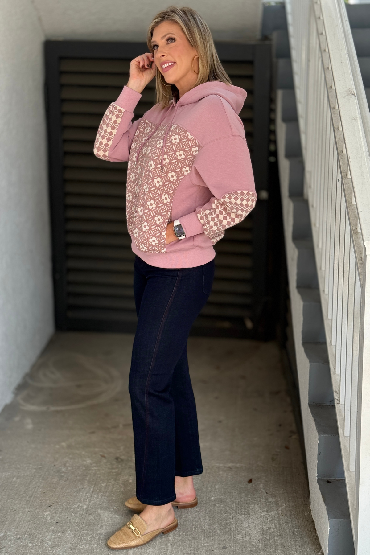 Mauve fall hoodie styled with dark wash denim and loafers