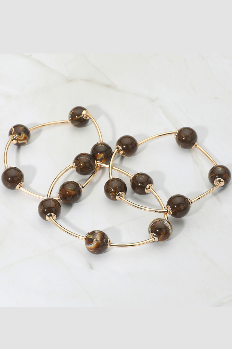 Brown multi-layered stretch bracelet set with round beads