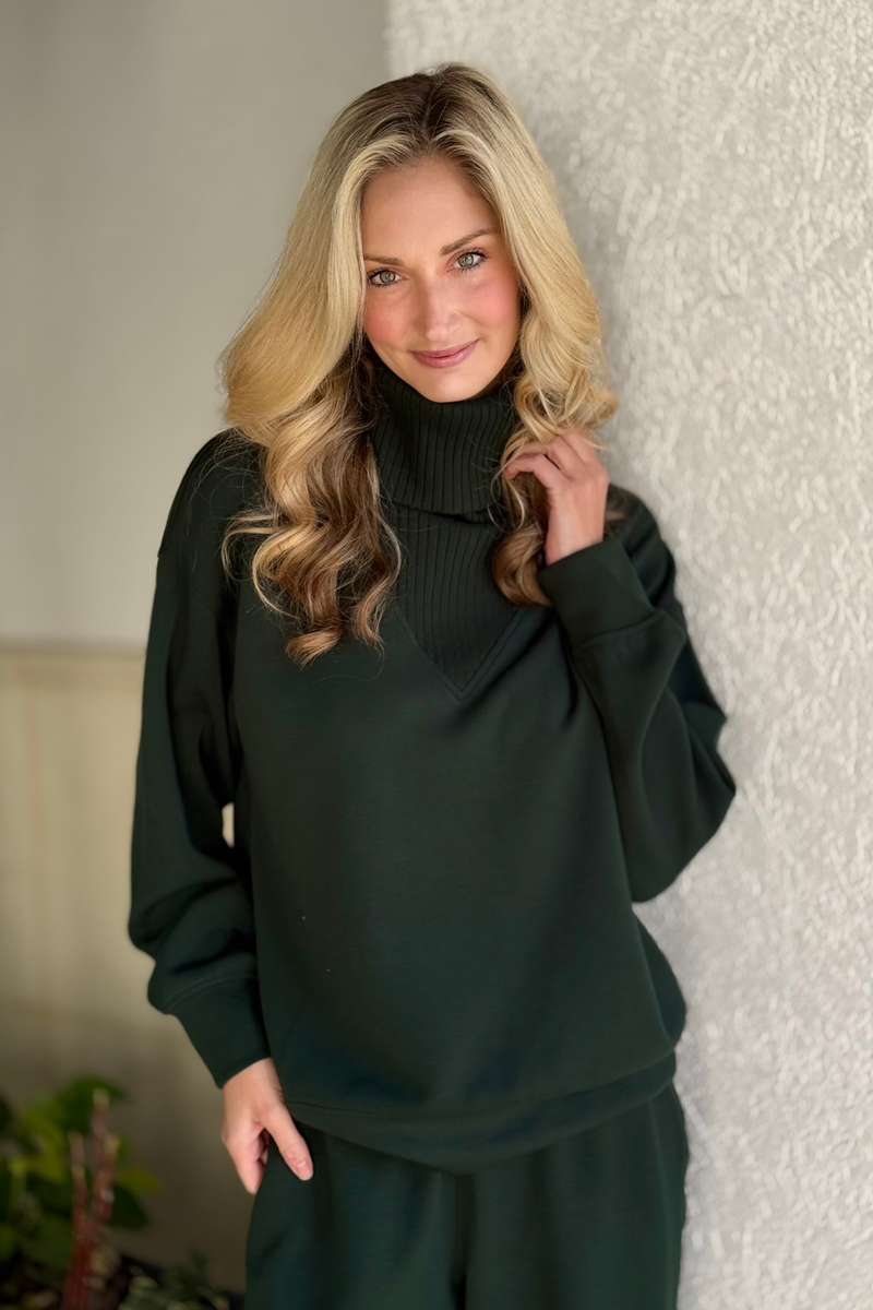 Regency Green Modal Scuba Jogger Pants with elastic waistband and cuffed ankles.