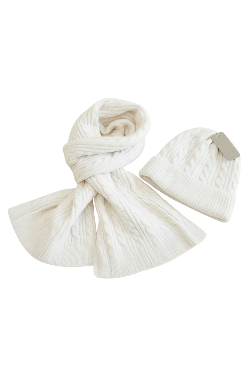Winter white cable knit scarf and beanie set featuring classic cable pattern and ribbed trim – women’s 2-piece winter accessory set.