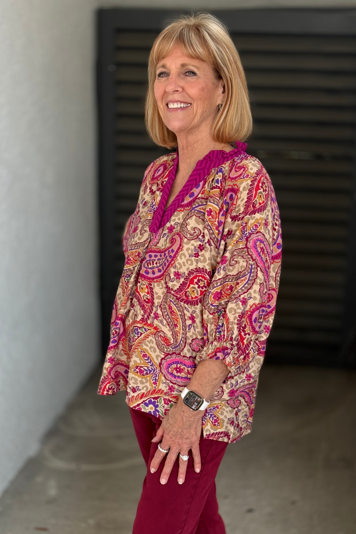 Bohemian paisley blouse with pink contrast trim.
