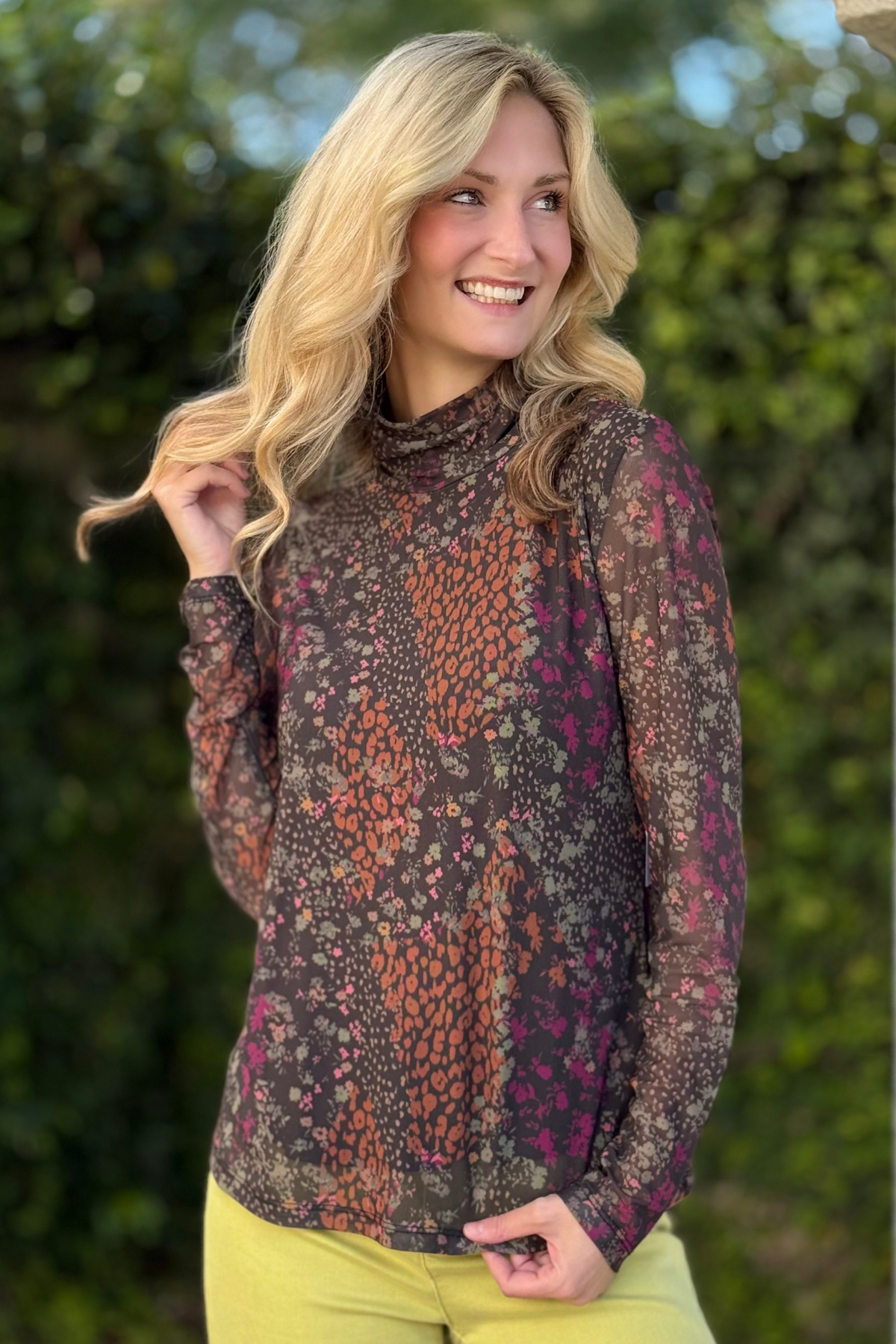 Front view of Tribal Mesh Turtleneck Top With Lining in Plumwine