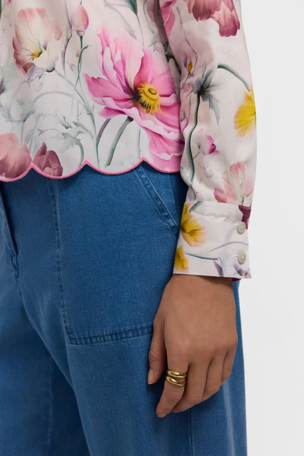 scalloped hem feminine blouse detail