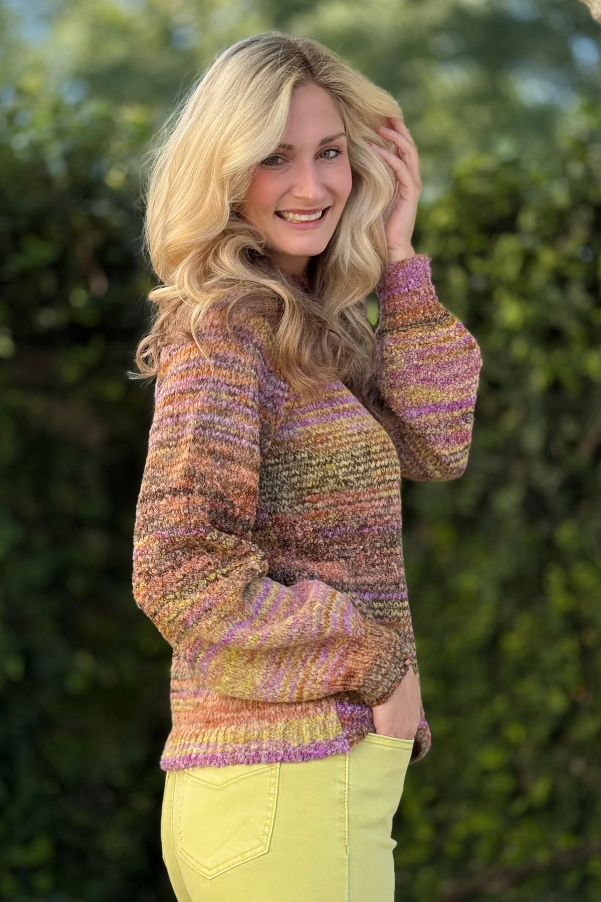 Detail of puff sleeve and fitted cuff on Tribal Mock Neck Sweater