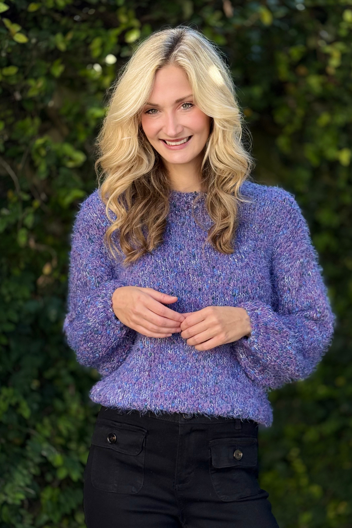 Close-up of eyelash pom pom yarn texture on Tribal sweater