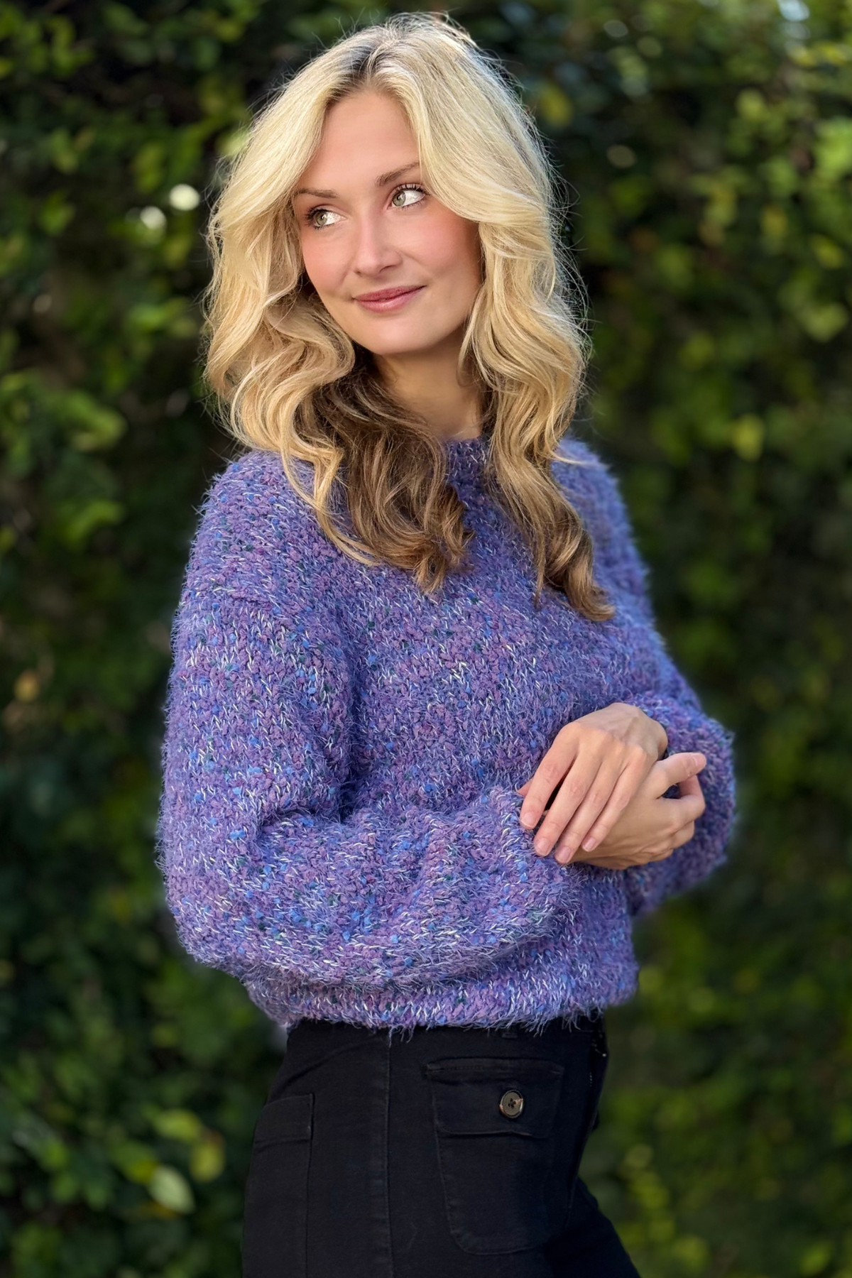 Detail of puff sleeves and ribbed finishing on M Blue Violet sweater