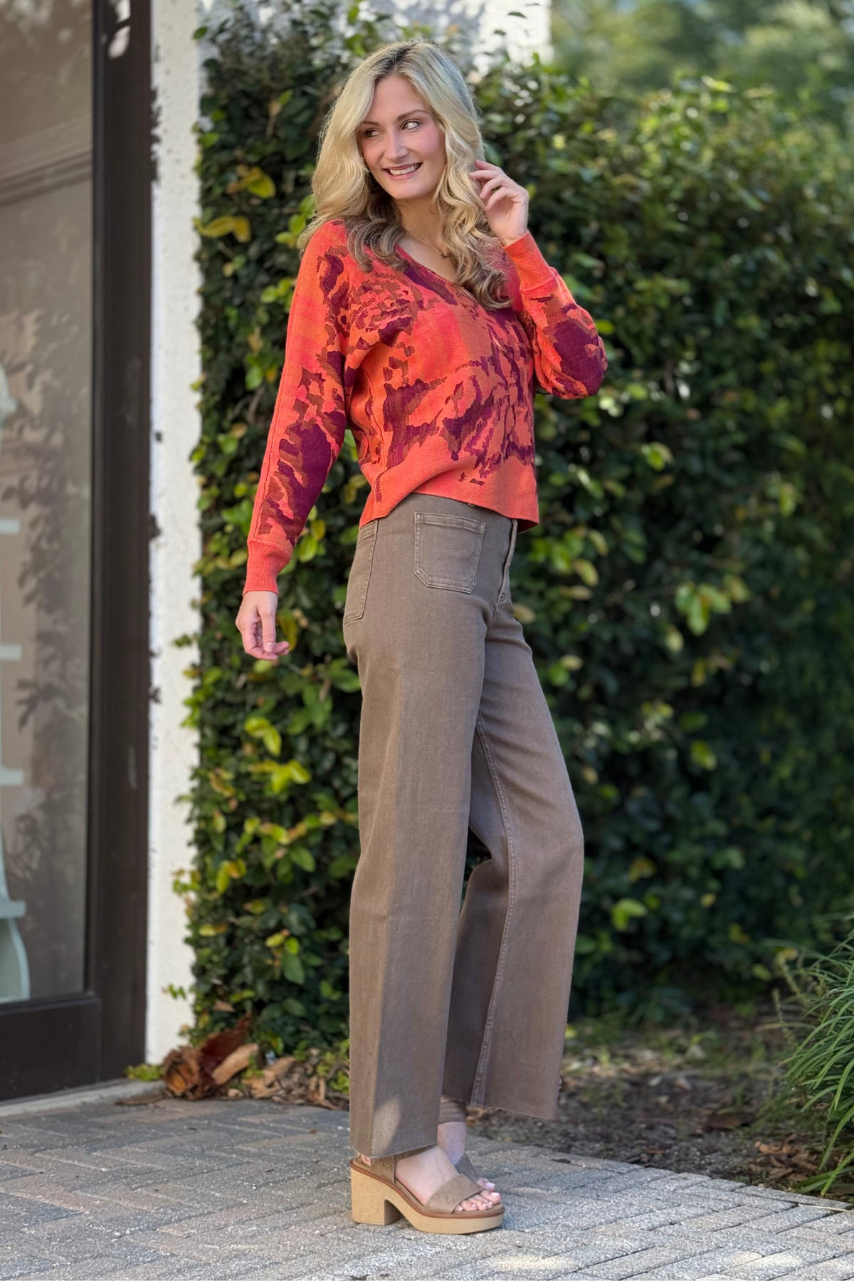 Detail of raw hem and washed brown denim texture