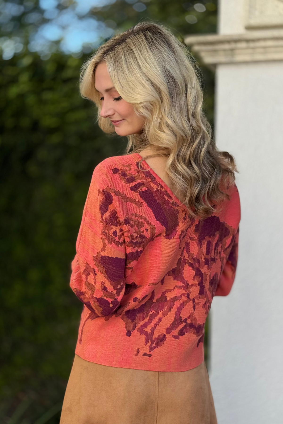 Close-up of V-neck and crew neckline on reversible Tribal sweater