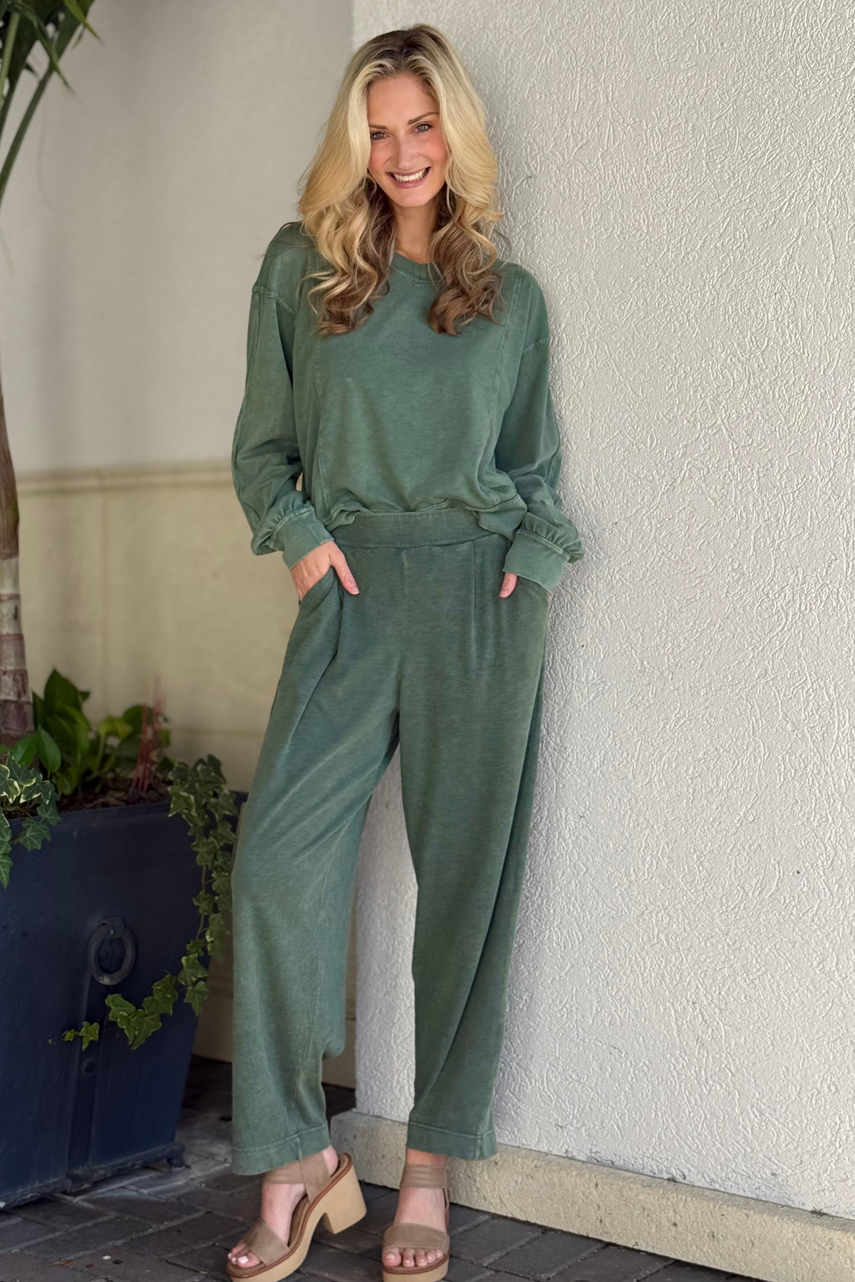 Model wearing The Regency Green Slub Cotton Cocoon Joggers front view