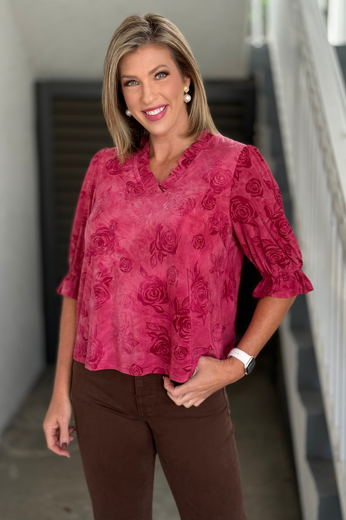 Red floral burnout blouse with ruffled V-neckline