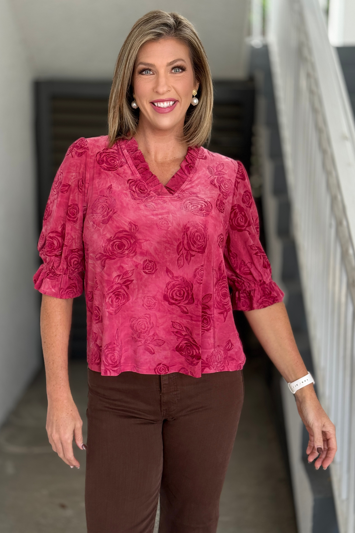 Women’s red rose print top with ruffle sleeve cuffs