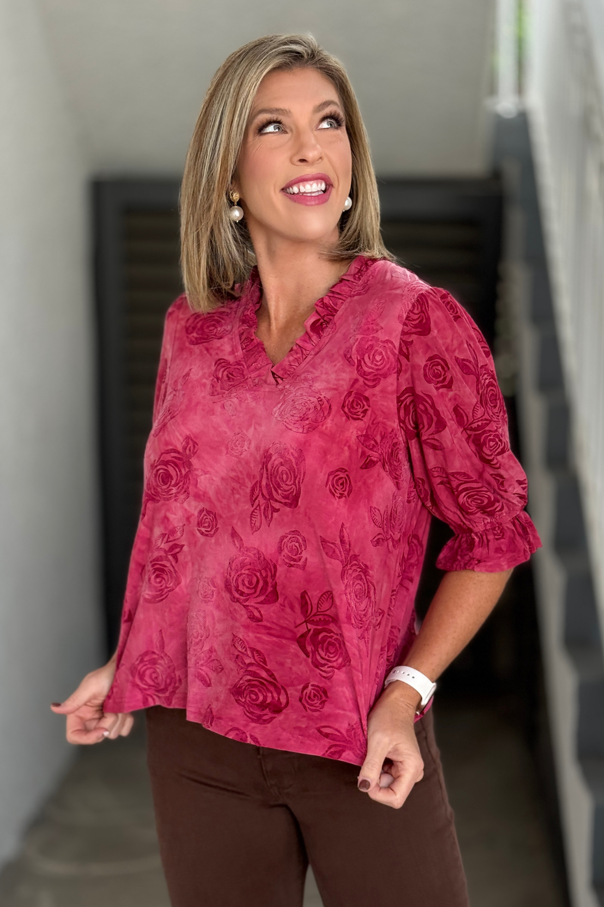 Soft textured floral burnout top styled with chocolate pants