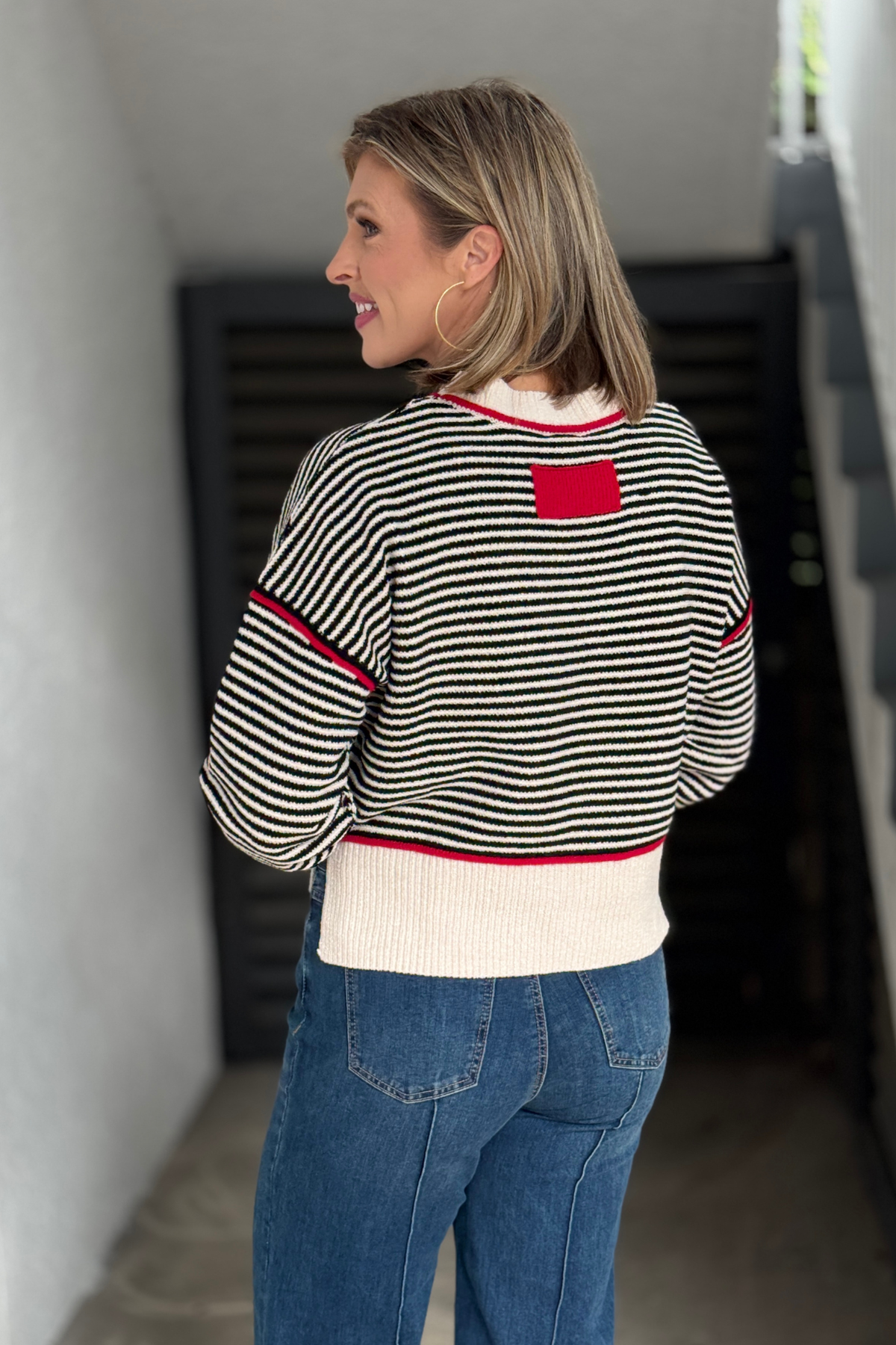 Lightweight striped fall sweater styled with denim