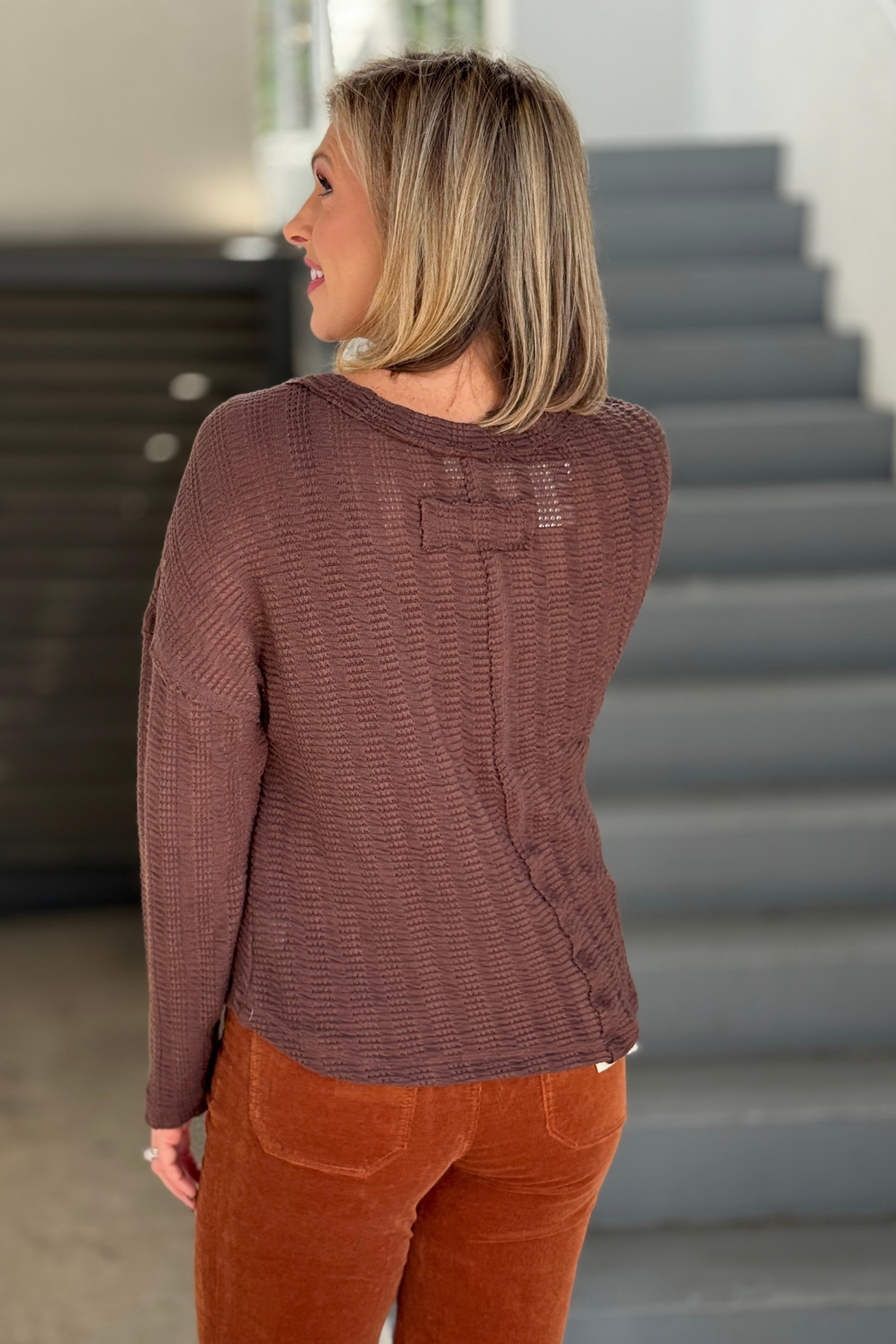 Women’s reversible chocolate boat neck knit top