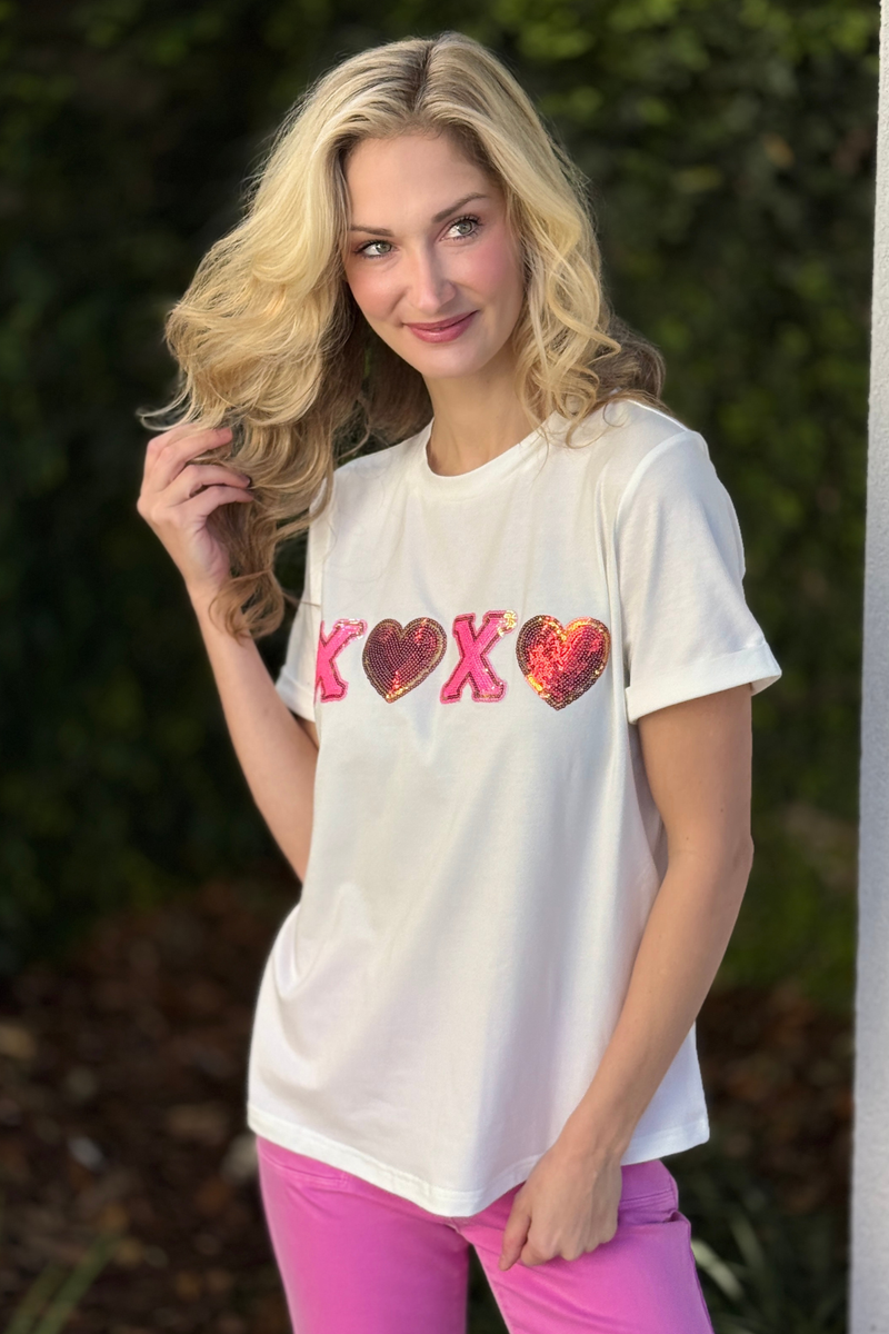 White Valentine shirt with pink and red sequin heart lettering detail