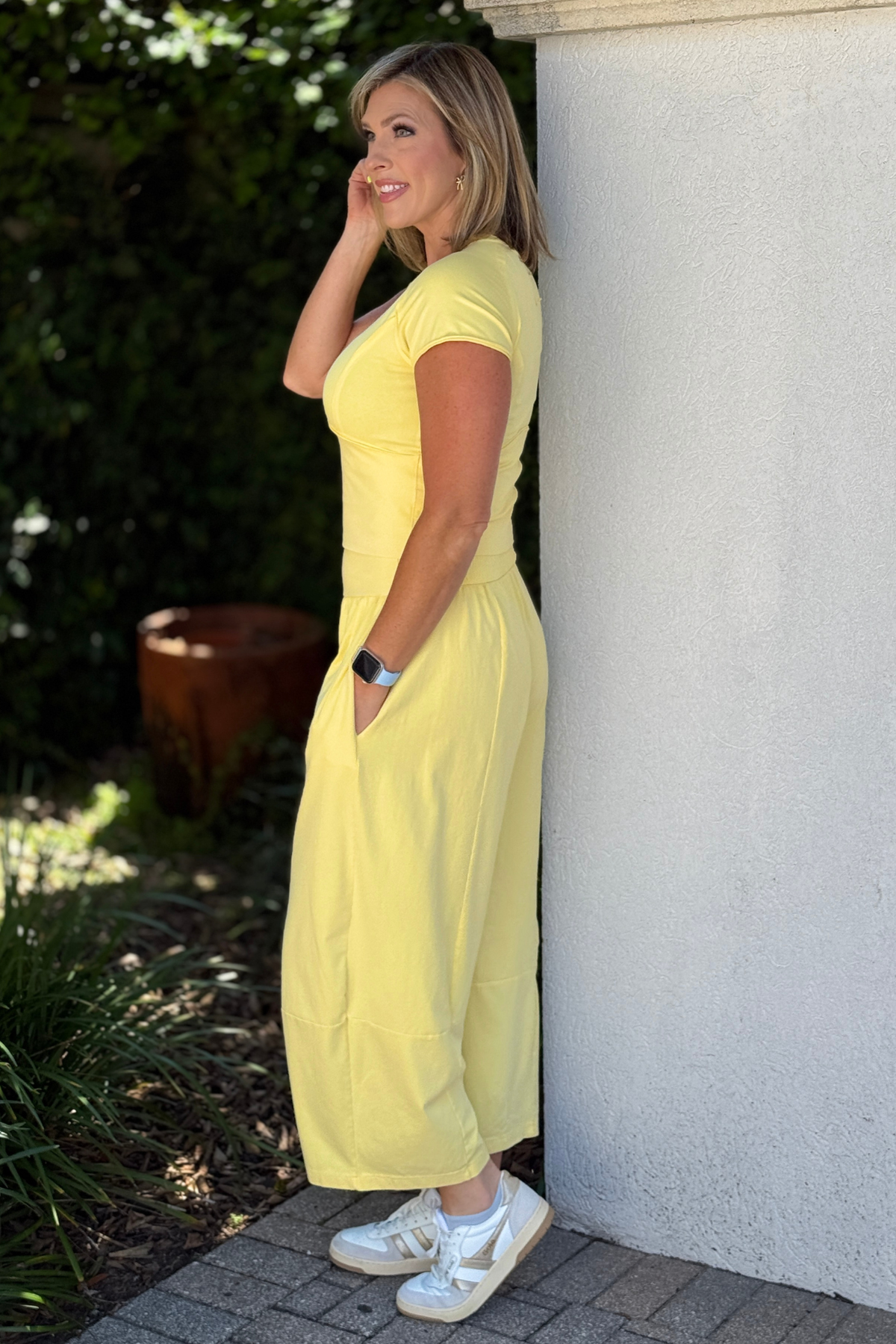 Casual spring outfit featuring butter yellow pants
