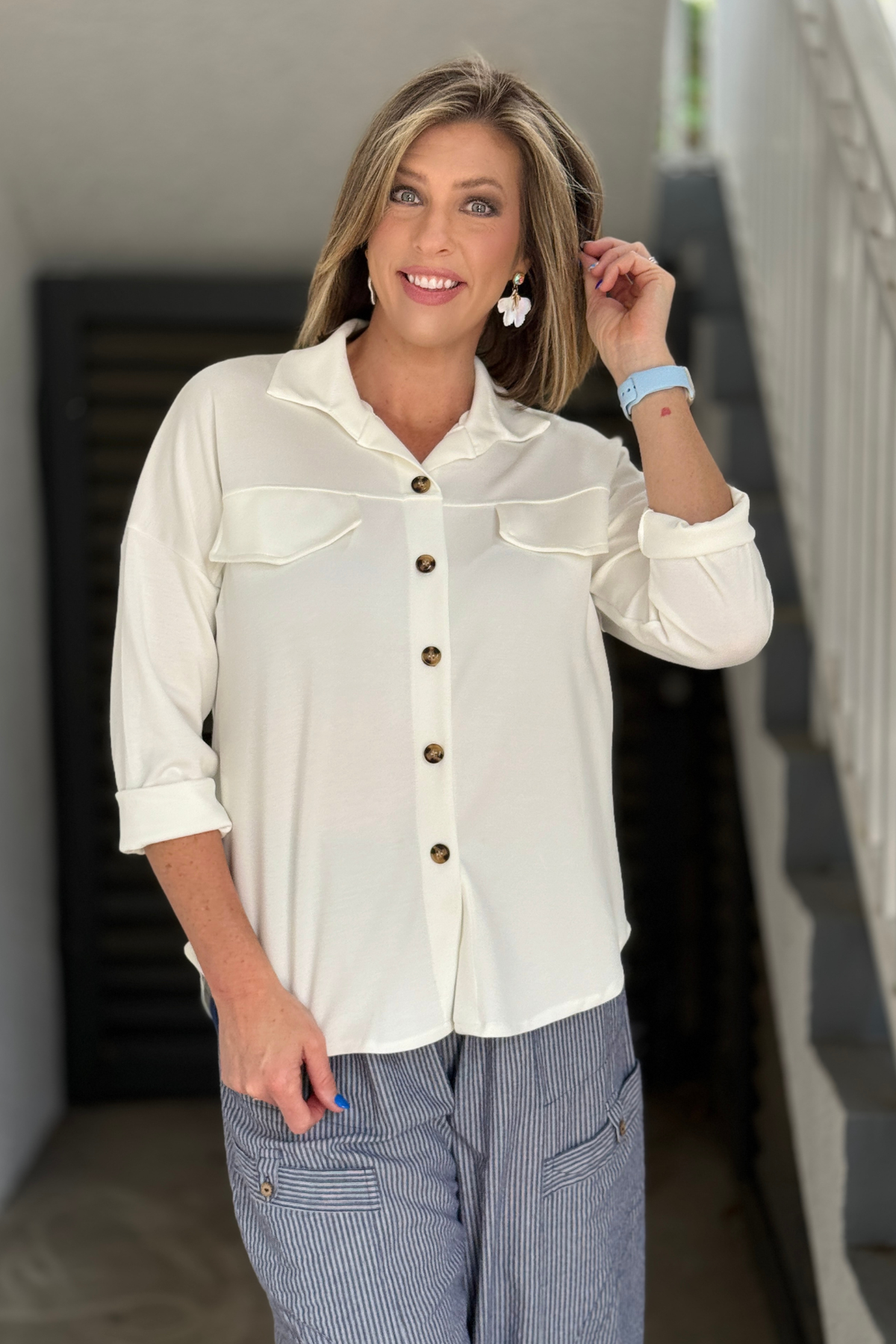 butter soft white shirt jacket with relaxed fit and rolled sleeves