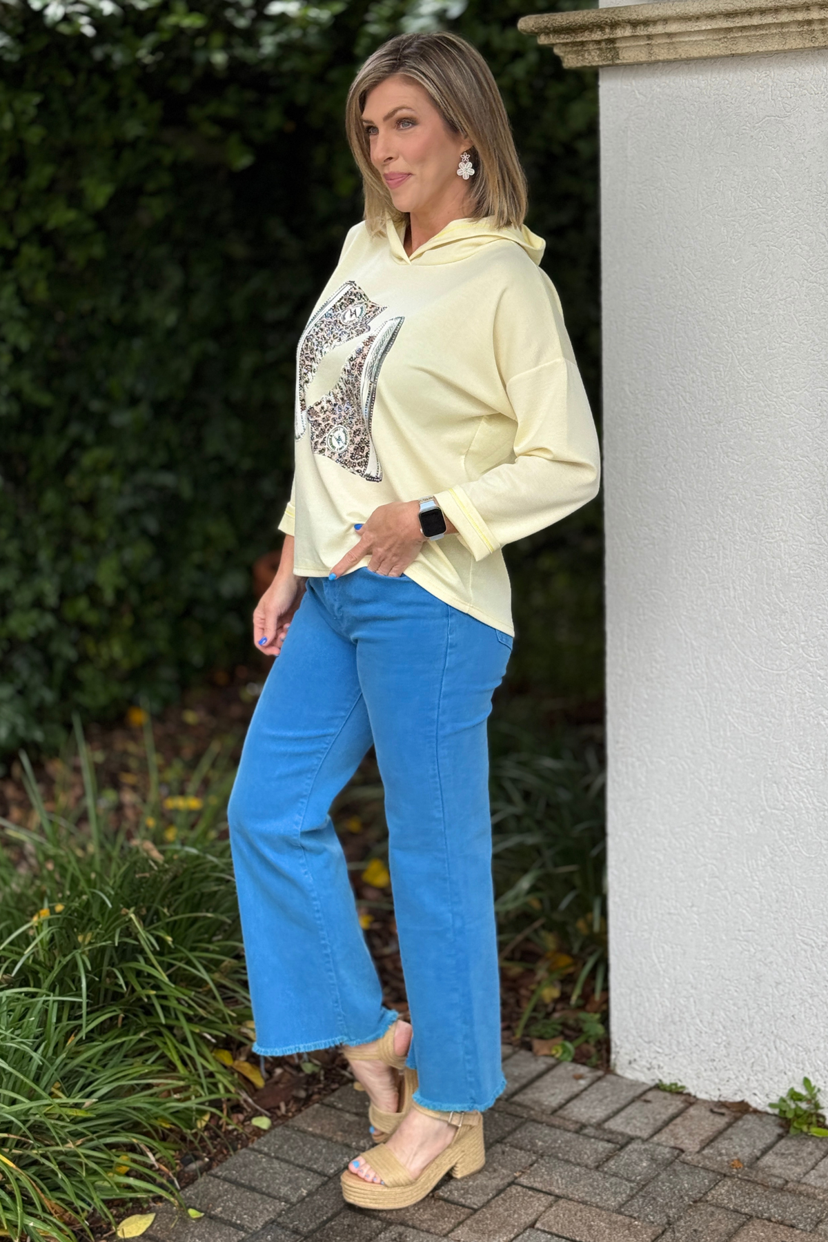 Back view of relaxed fit modal hoodie with hood detail