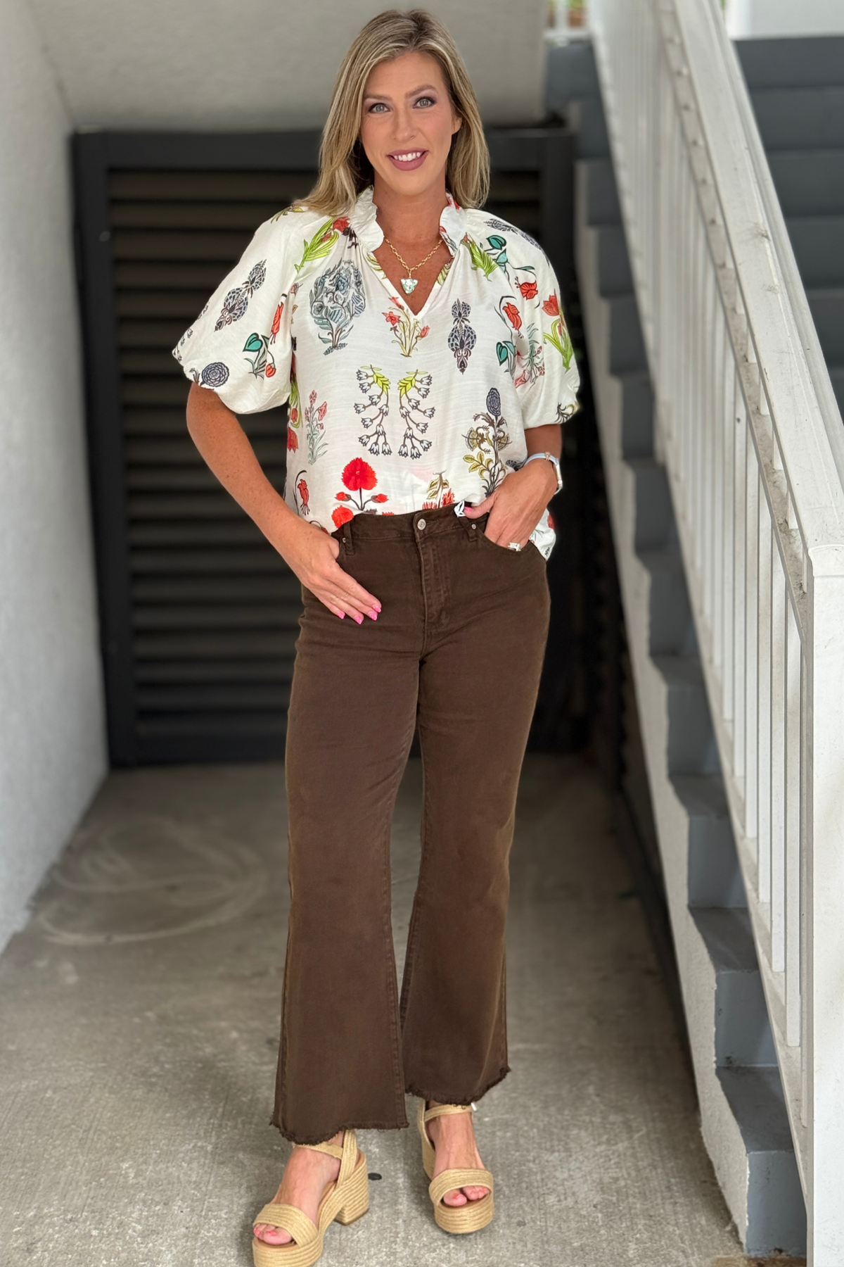 Back view of The Essential Wide Leg Jeans in Espresso showcasing the high-rise waist, flattering fit, classic back pockets, and wide leg silhouette.