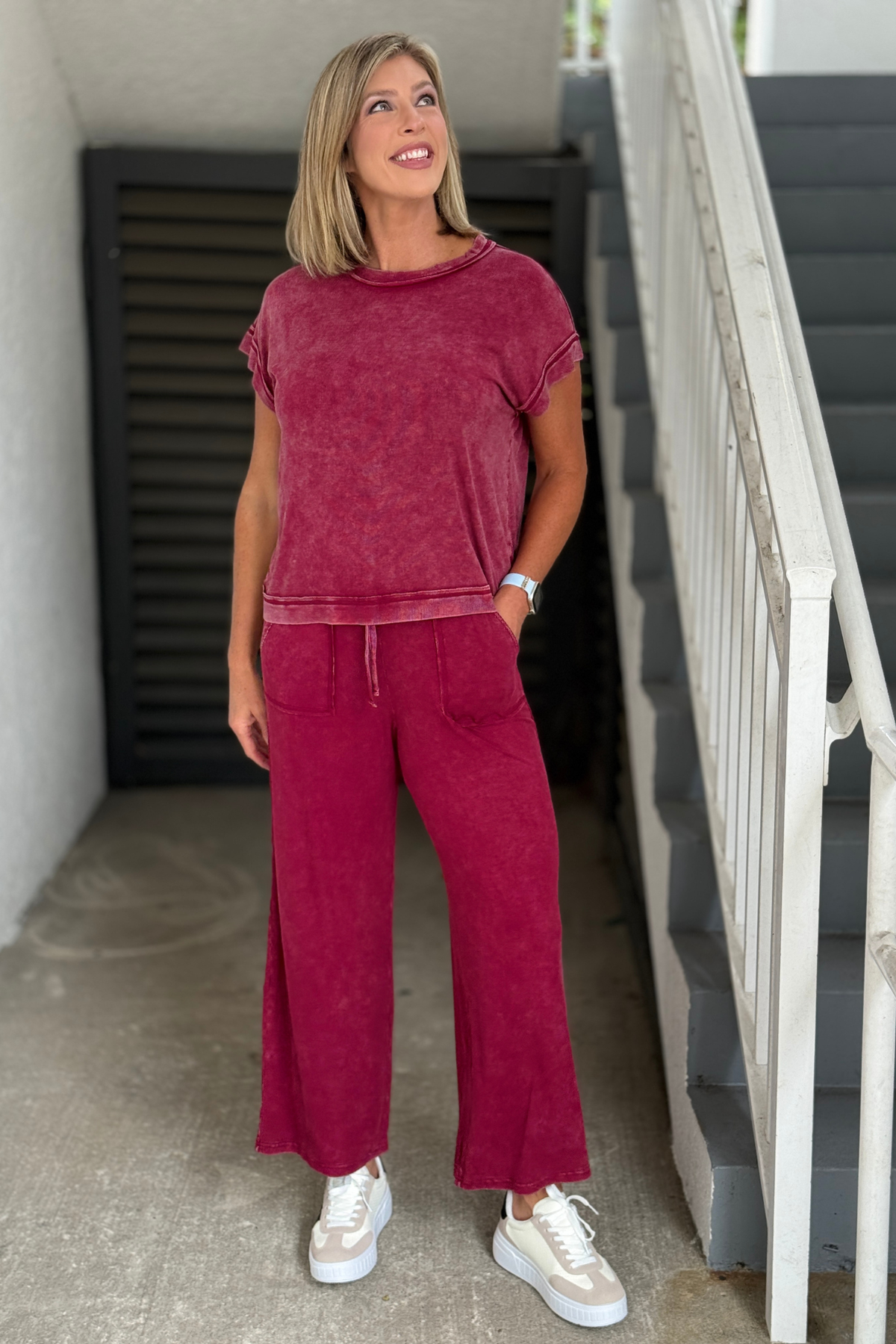 Back view of the Mineral Wash Wide Leg Lounge Set in Cabernet showing the relaxed fit and wide leg silhouette.