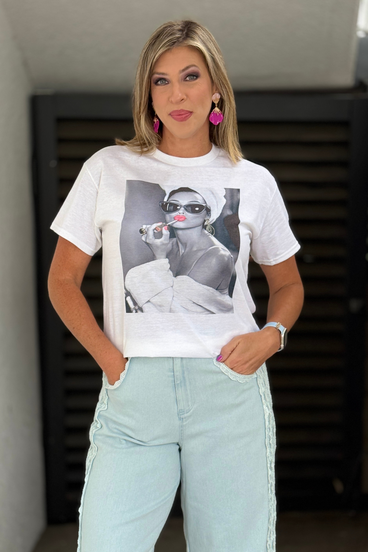 Woman wearing Audrey fashion graphic white tee