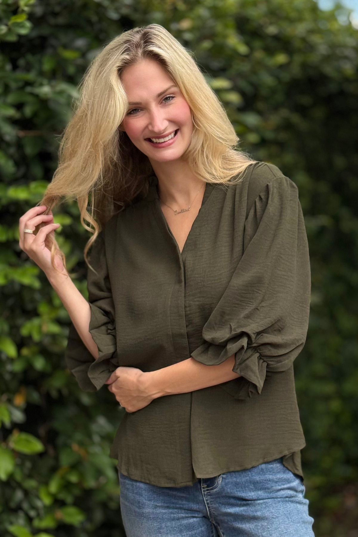 Model wearing chic balloon sleeve blouse with 3/4 gathered sleeves – Chic Essence Top