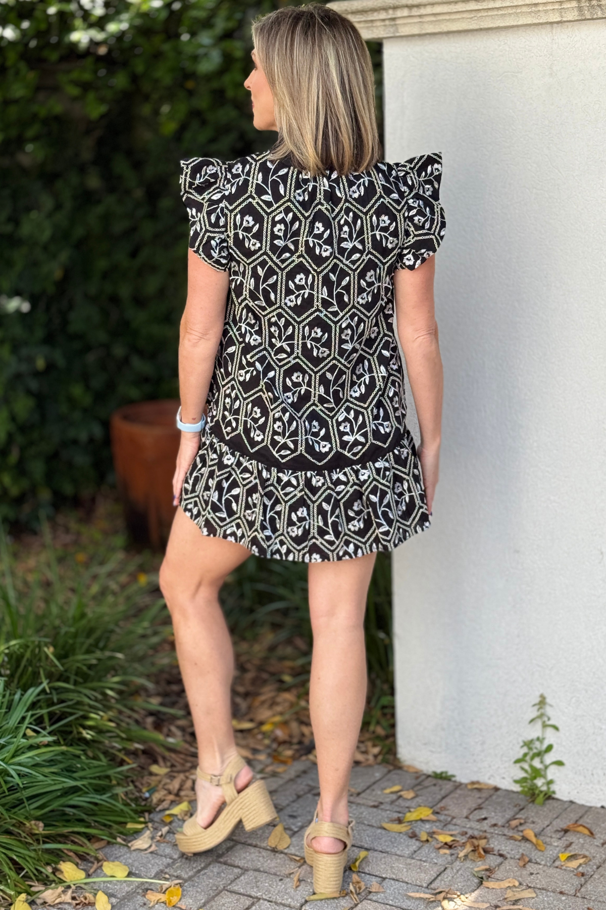 elegant black embroidered dress styled for day or night