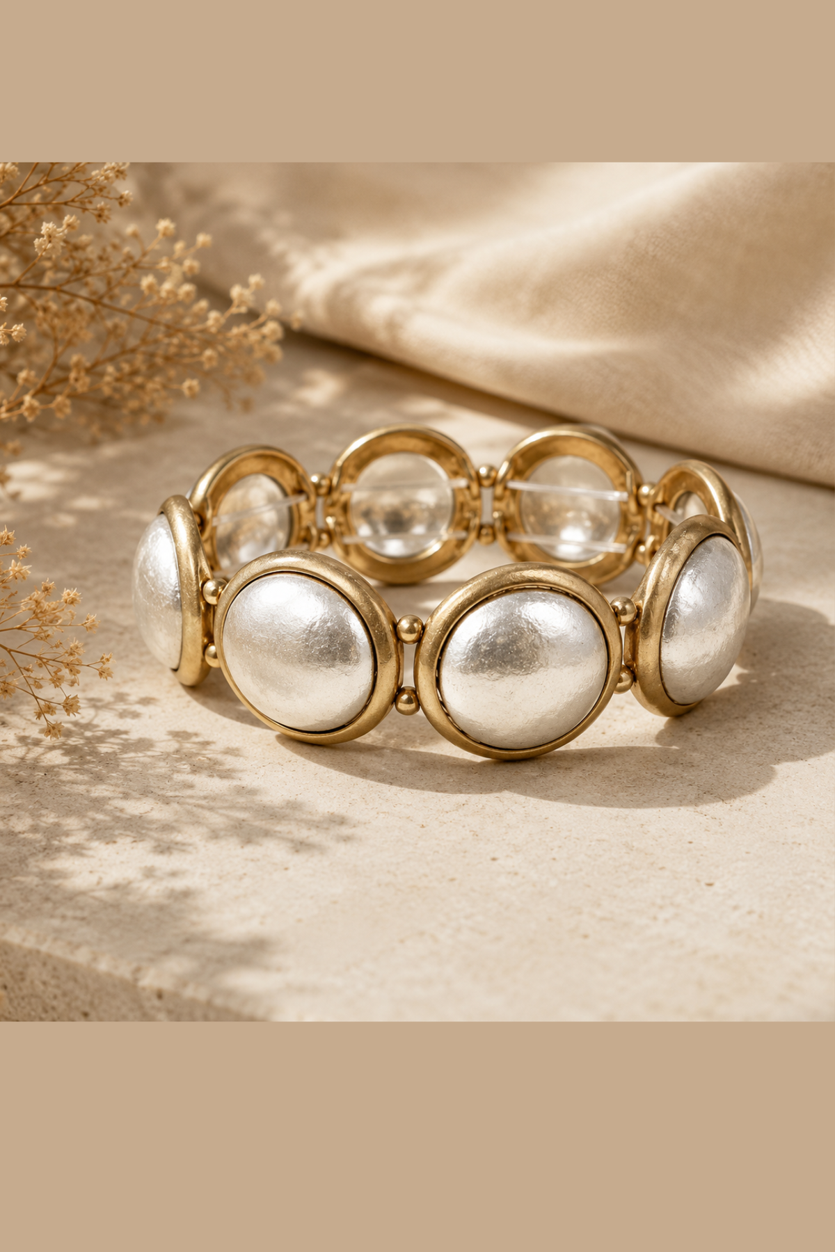Silver and gold stretch bracelet.