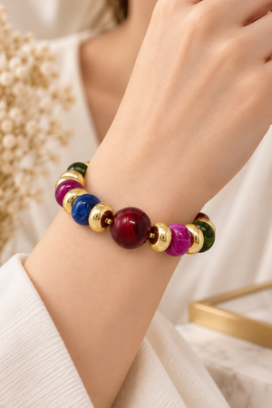 Chunky resin beaded stretch bracelet with jewel tone beads and gold accents