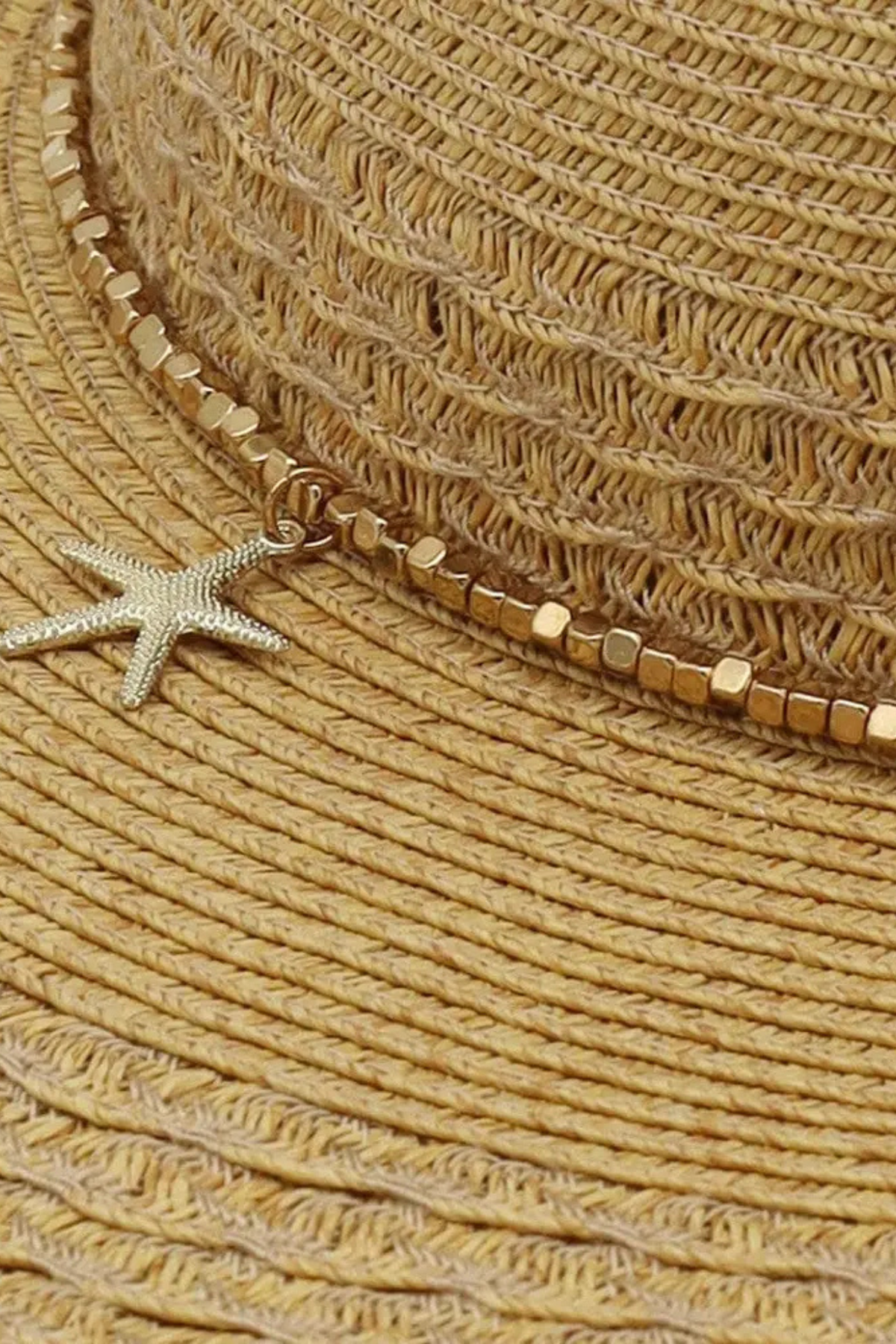 Beach straw hat with coastal-inspired sequin detail