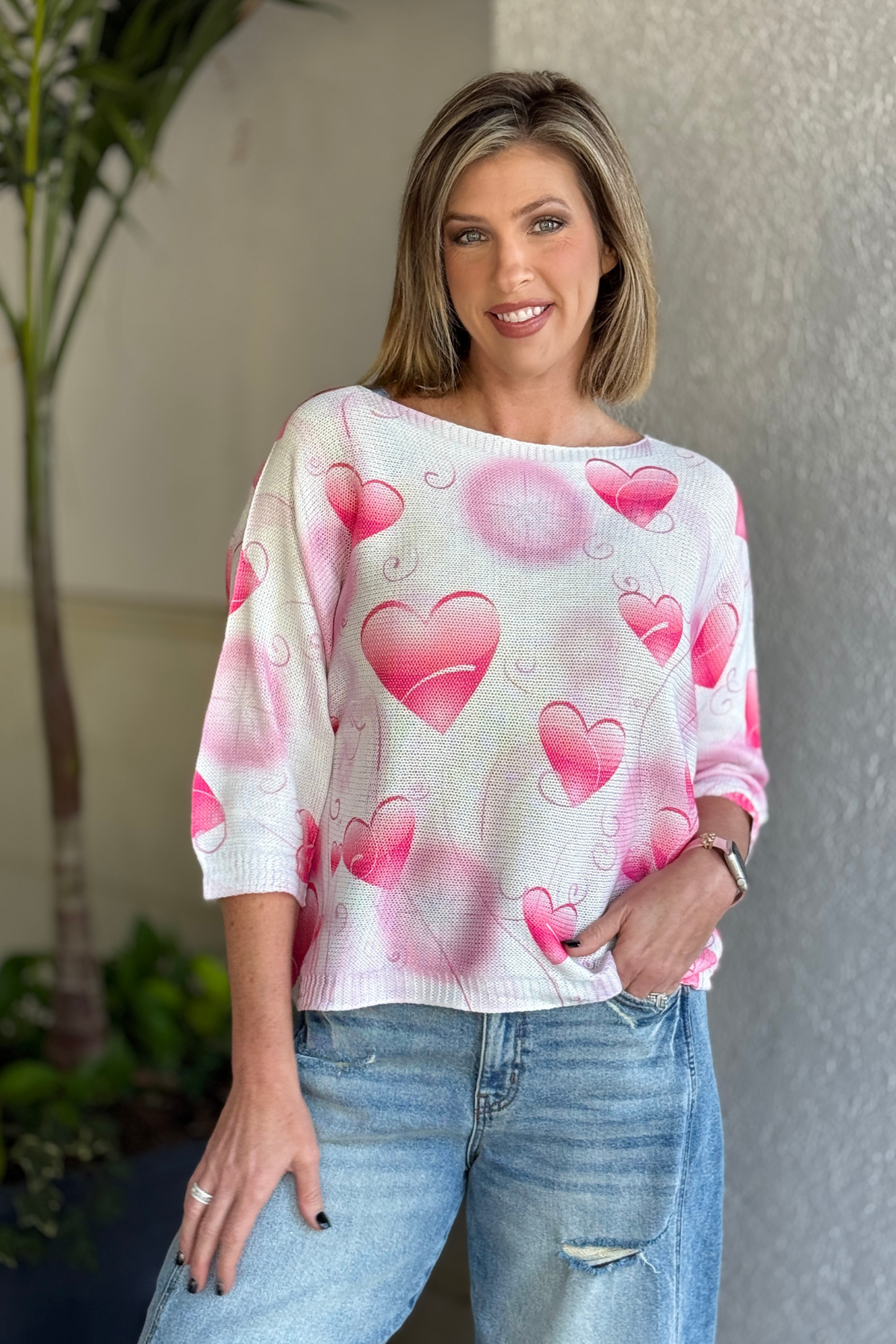 Woman wearing white raw edge cotton top made in Italy