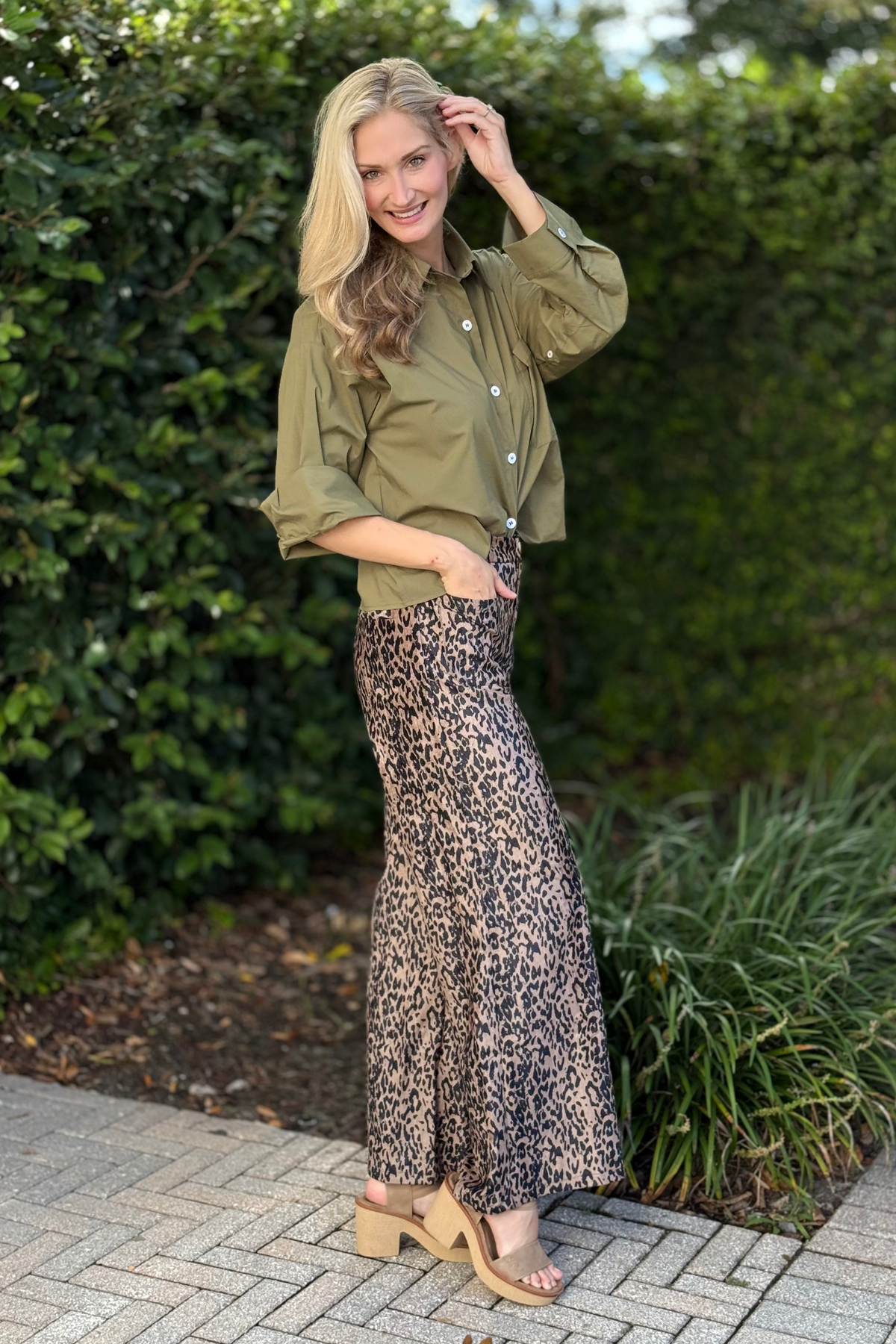 High-rise animal print pants with button and zipper closure
