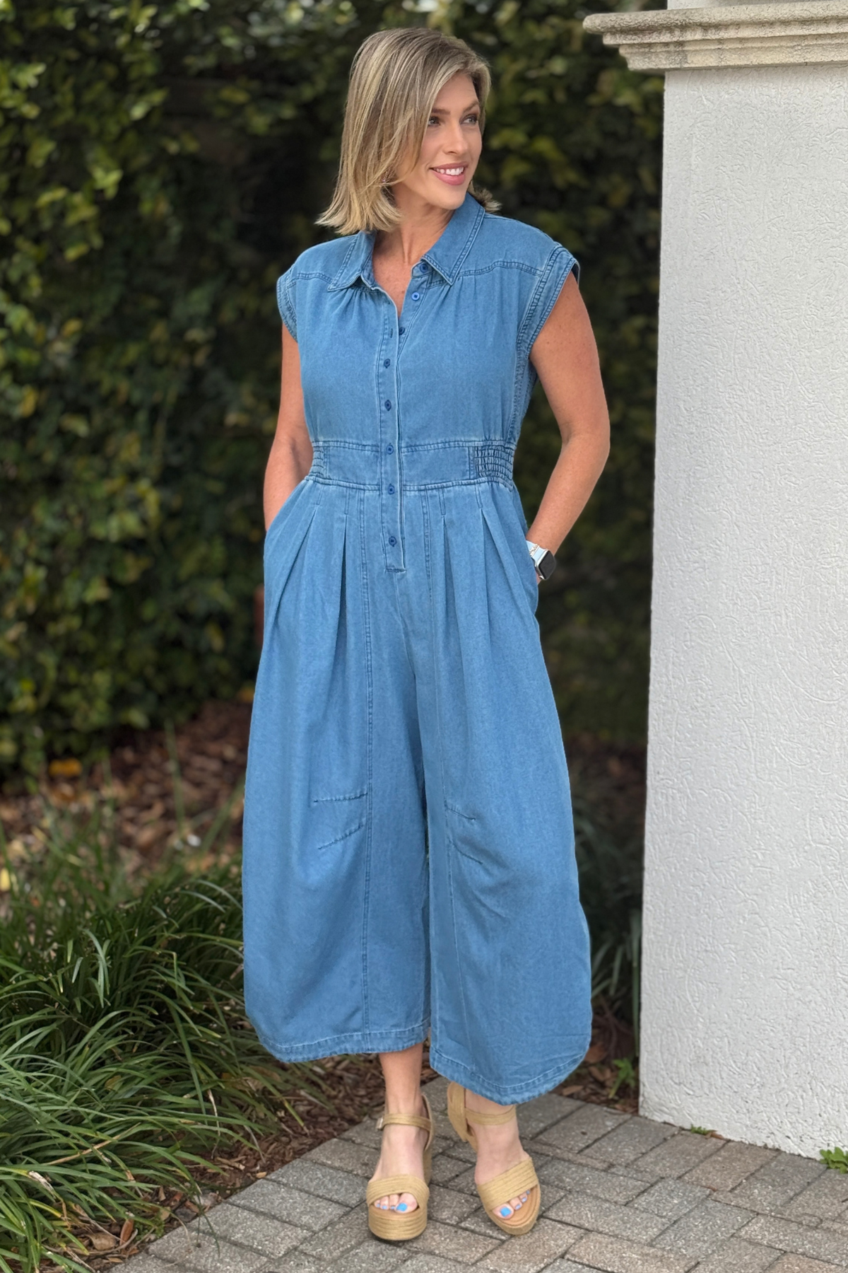 relaxed fit denim jumpsuit styled with wedges
