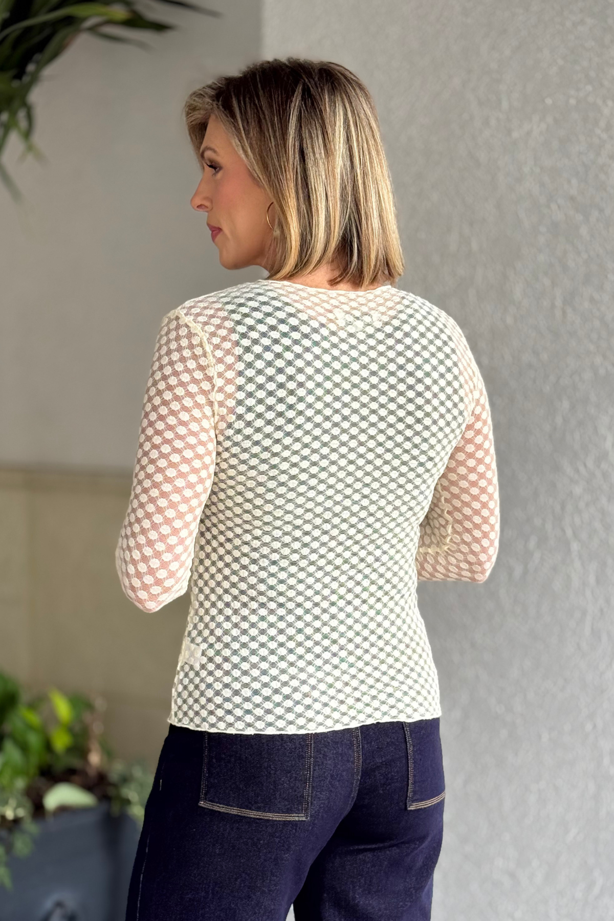 Semi-sheer polka dot mesh top in cream