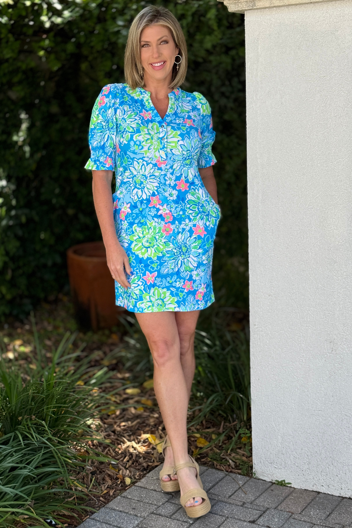 bright floral boutique dress with smocked sleeves