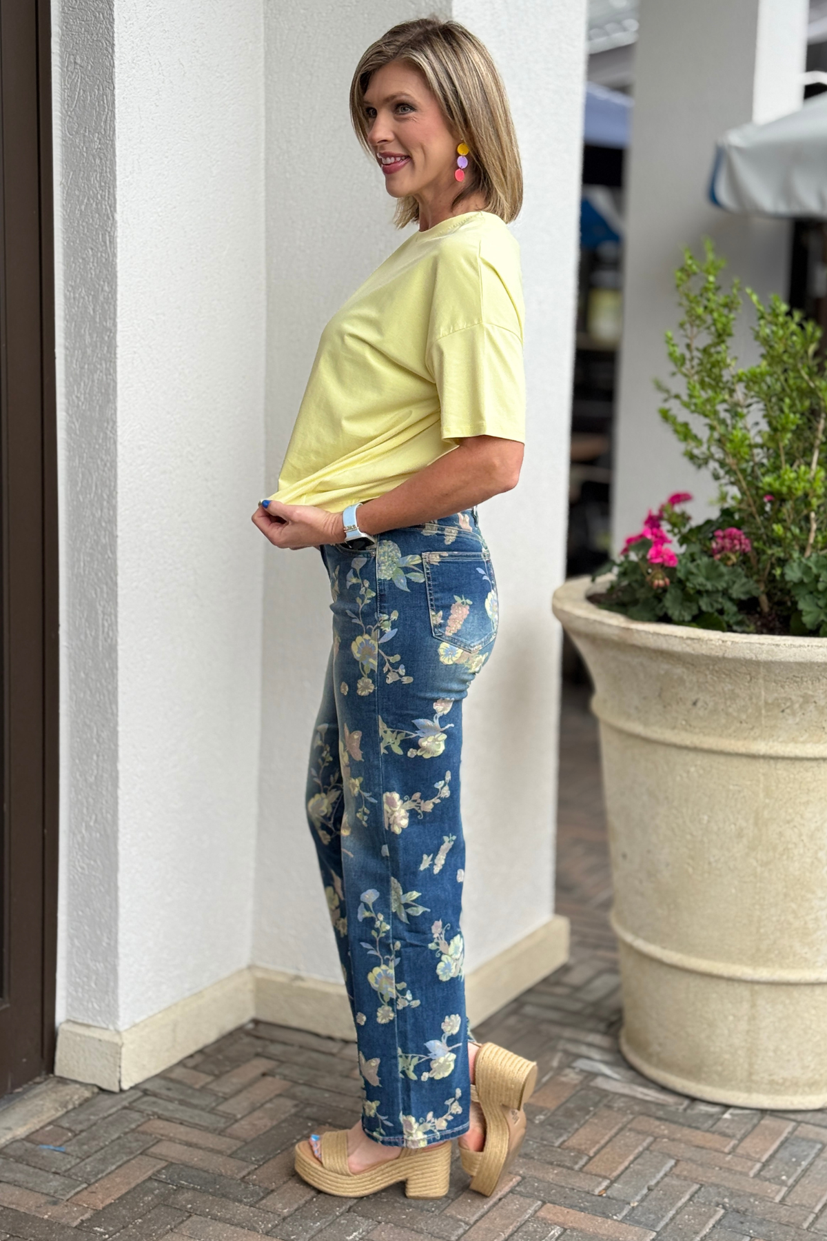 Close up of floral embellished denim with five pocket styling