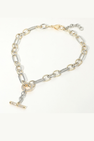 Two-tone chain necklace with CZ-studded toggle pendant and mixed metal links