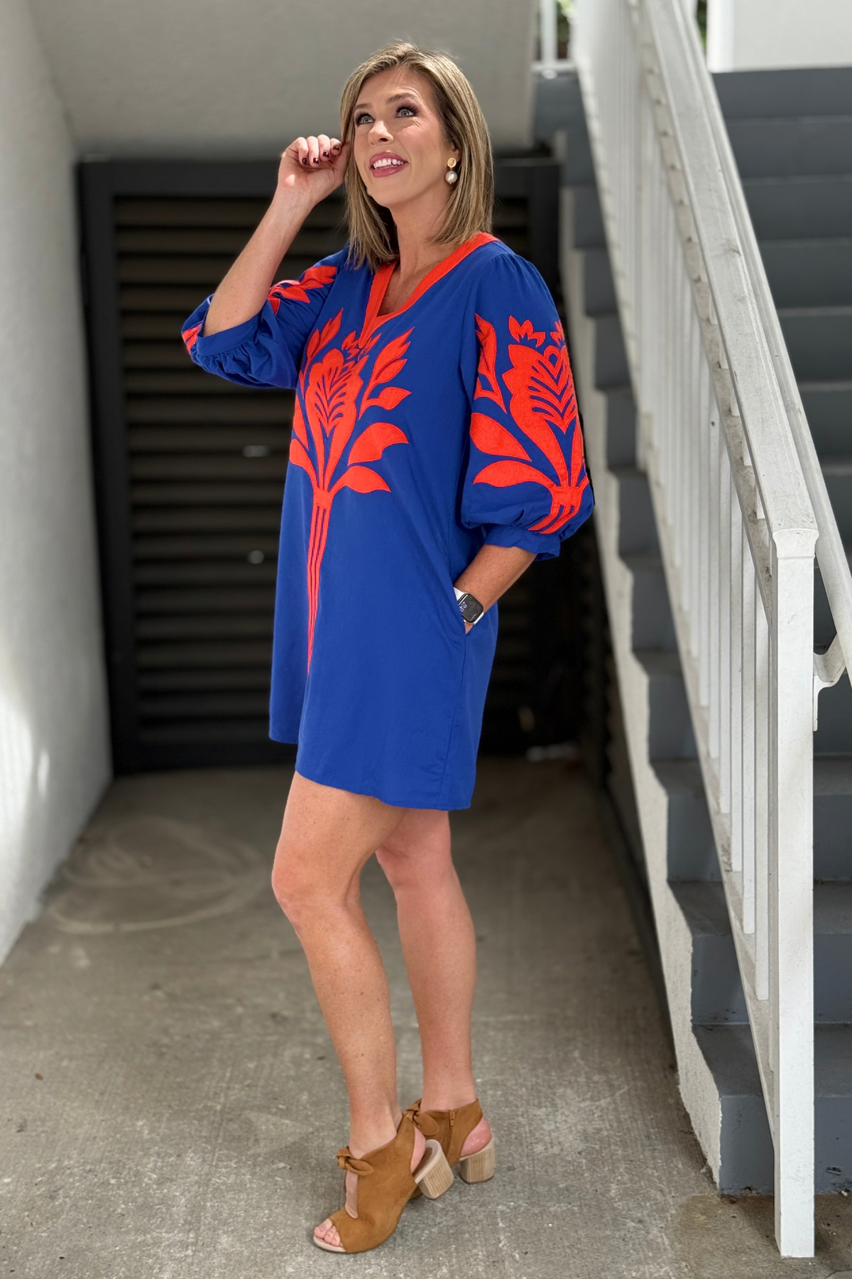 Women’s orange and blue football game day dress with pockets  