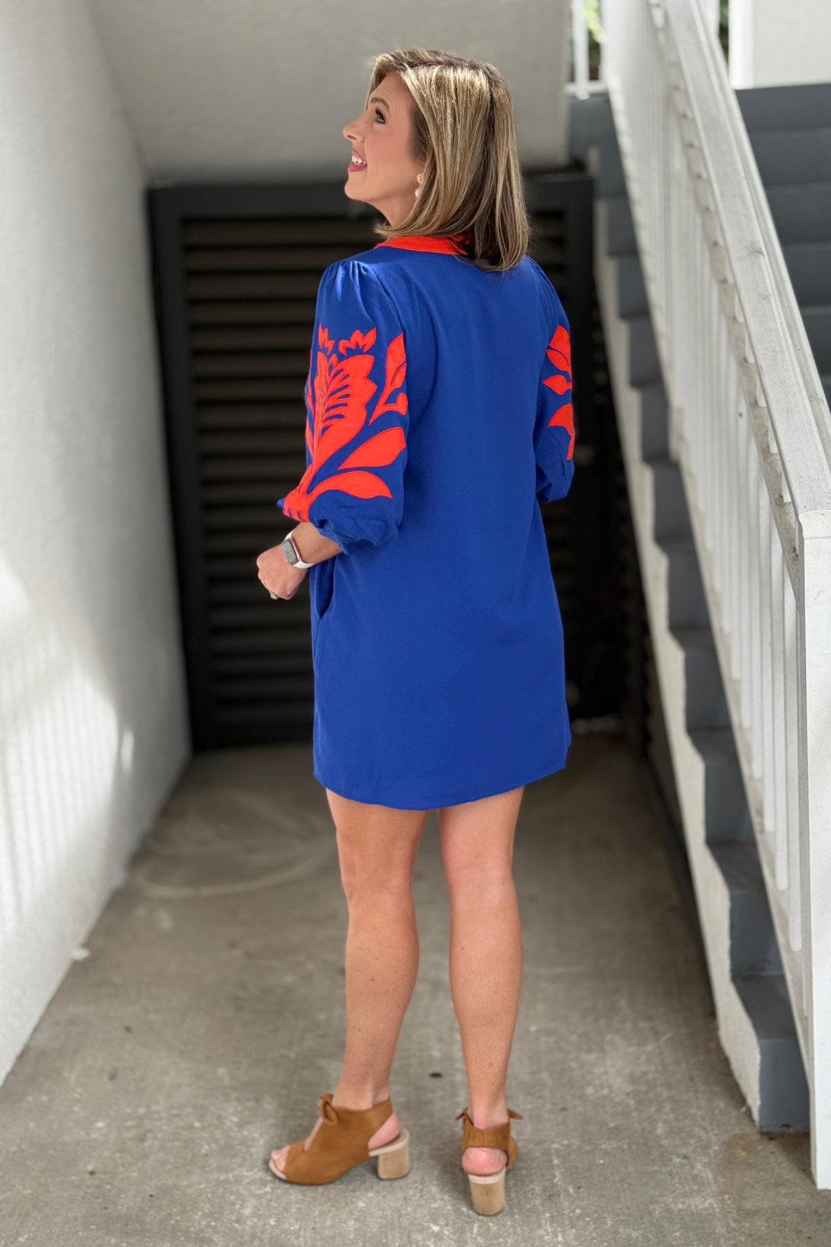 Orange and blue college game day boutique dress  
Blue shift dress with orange appliqué statement sleeves