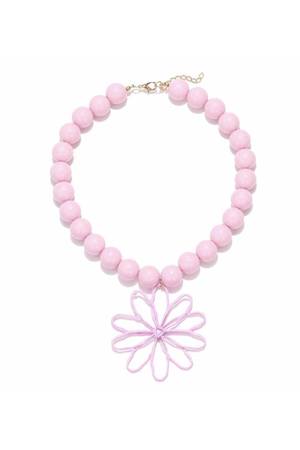 Pink beaded statement necklace with oversized floral pendant