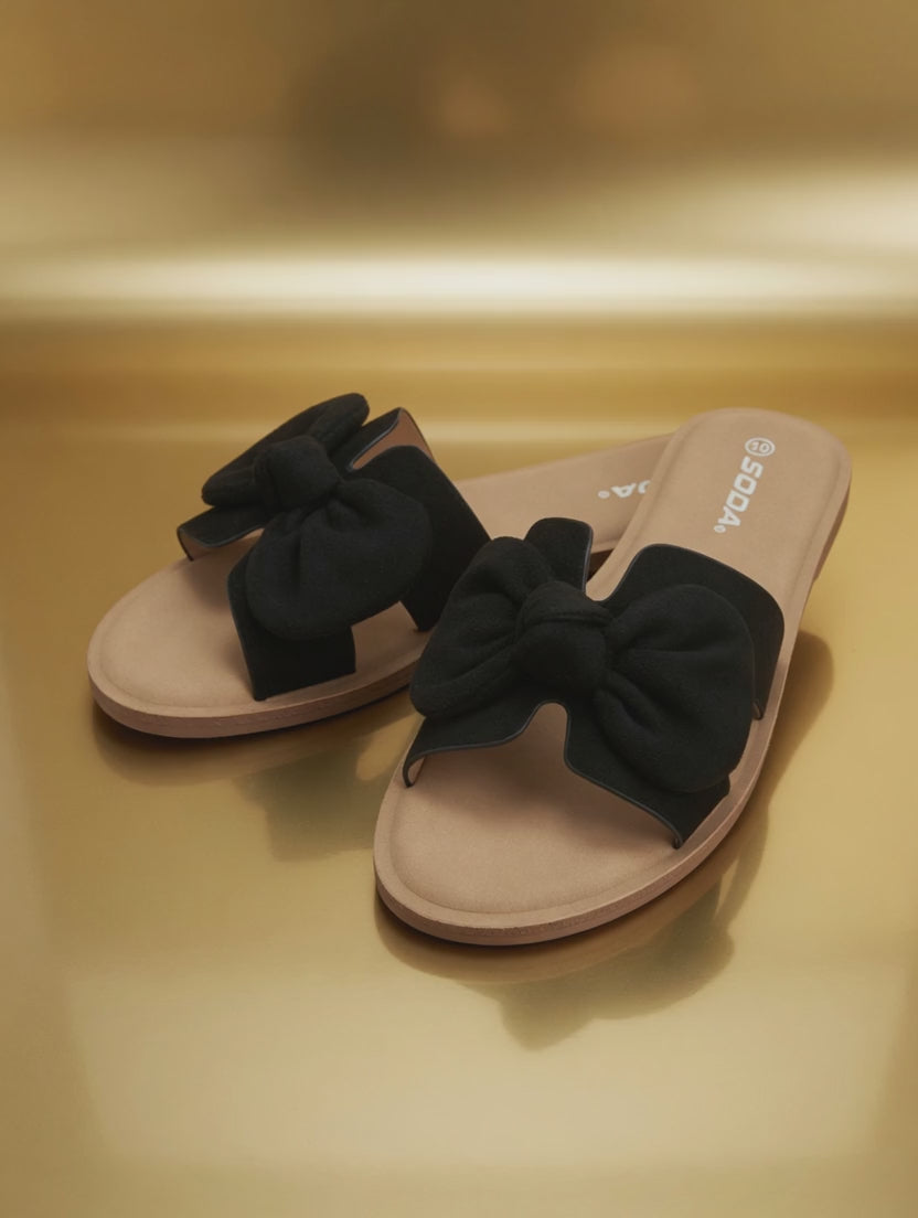 Casual black boutique slide sandals with bow detail