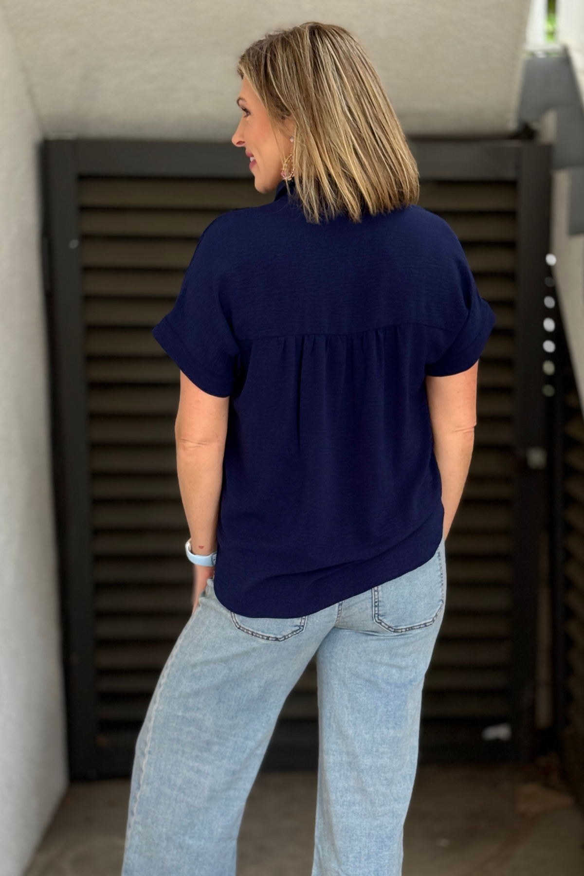 flowy navy button down shirt casual outfit