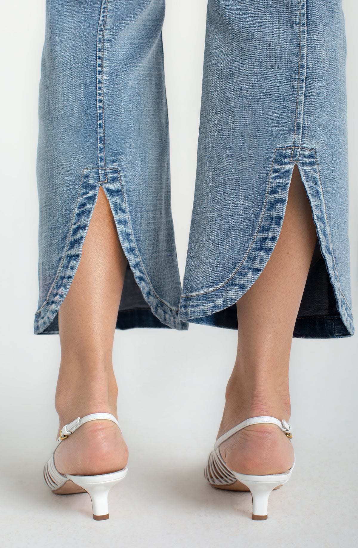 Women's pull on flare jeans with tulip back hem