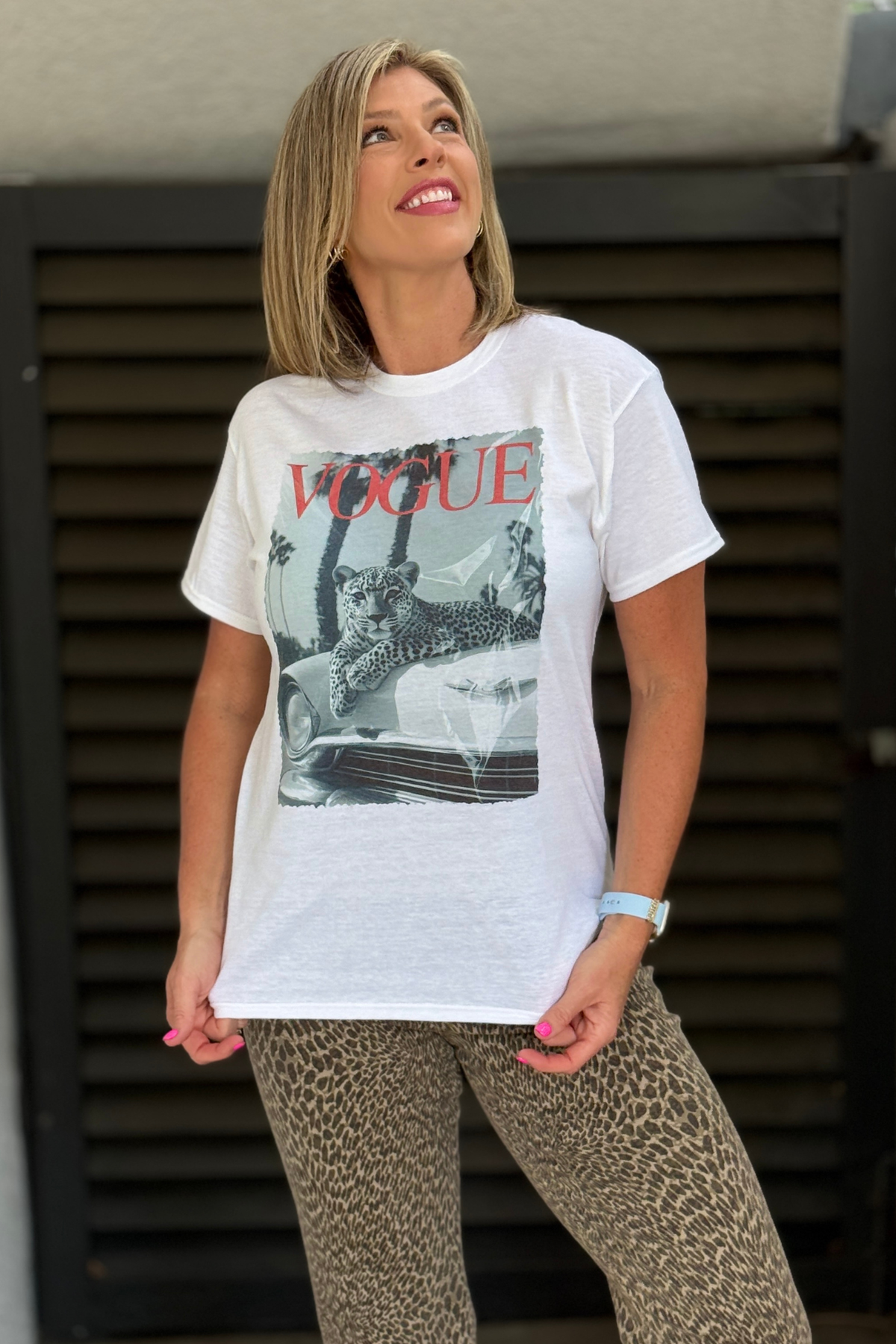 white graphic tee with fashion inspired leopard car design