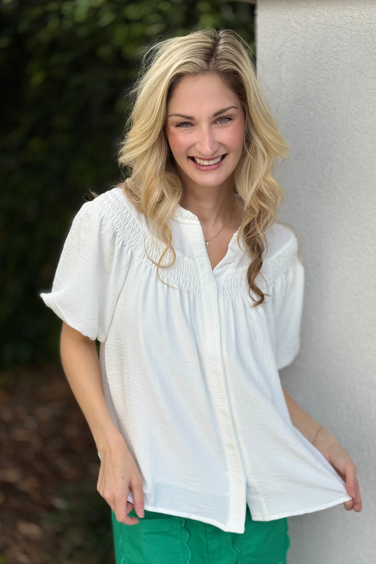 White puff sleeve blouse with smocked yoke detail